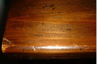 This shows a stained wood surface.