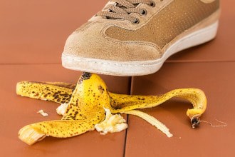 This picture shows a foot about to slip on a banana peel. It symbolizes a safety hazard.