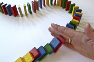 This shows a line of dominoes. When one falls, it put the next in motion. Similarly, sanding must be done in order. That is, coarse grits before medium and then fine.