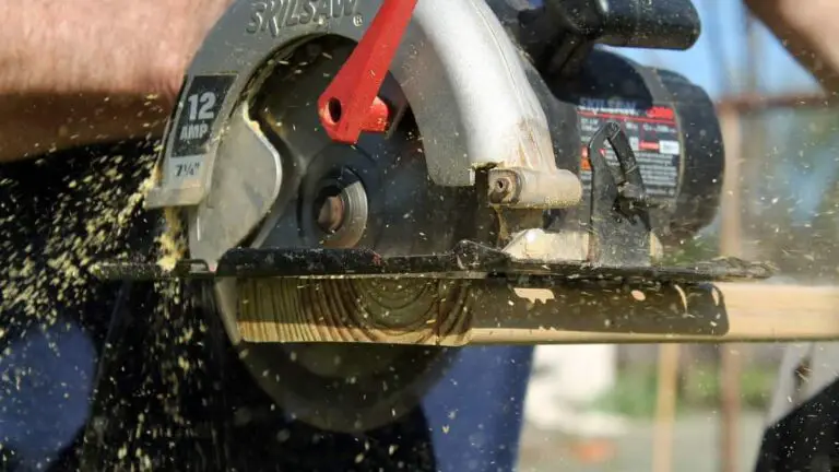 Circular saw cutting through wood