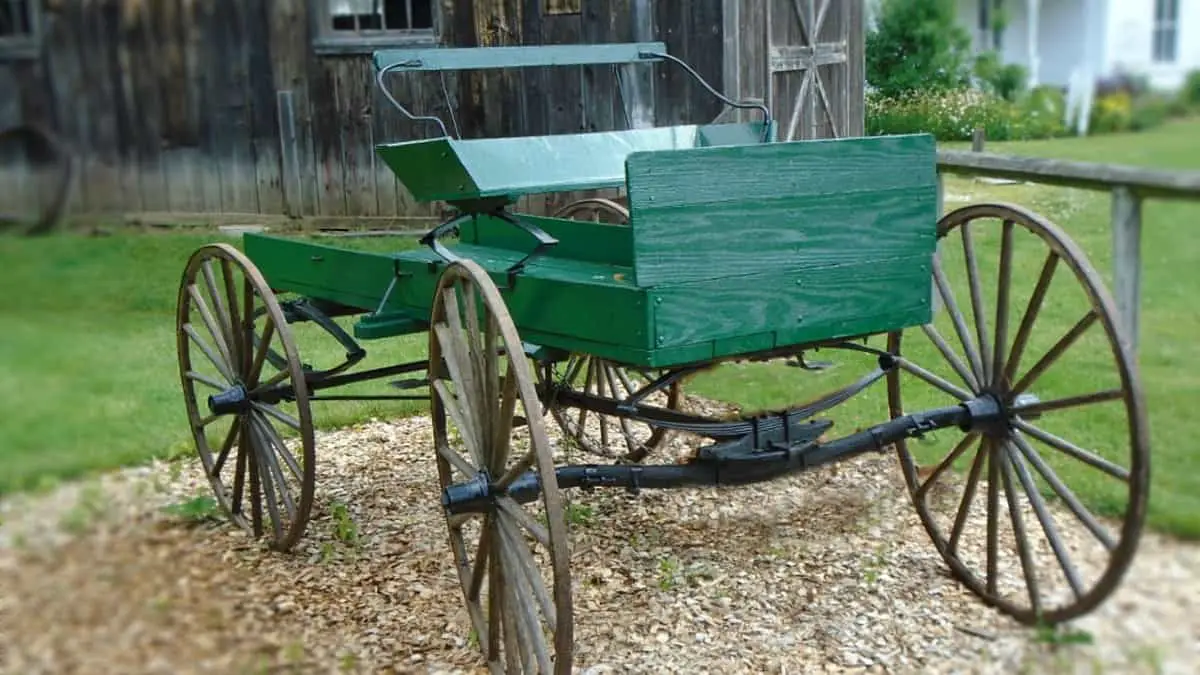 A green wagon made with carriage bolts