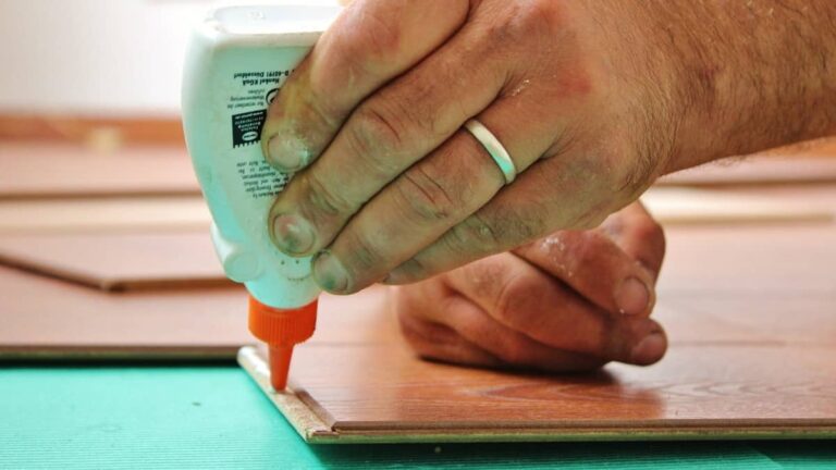 Man applying glue