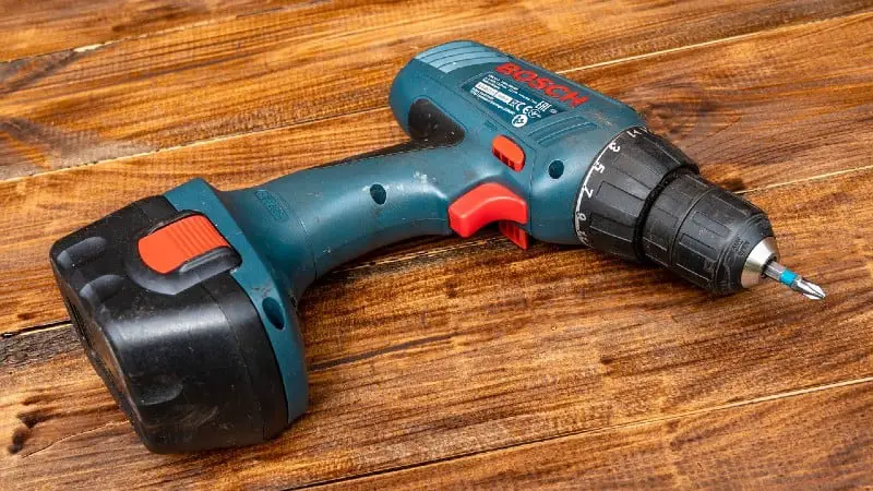 Drill driver with screwdriver bit