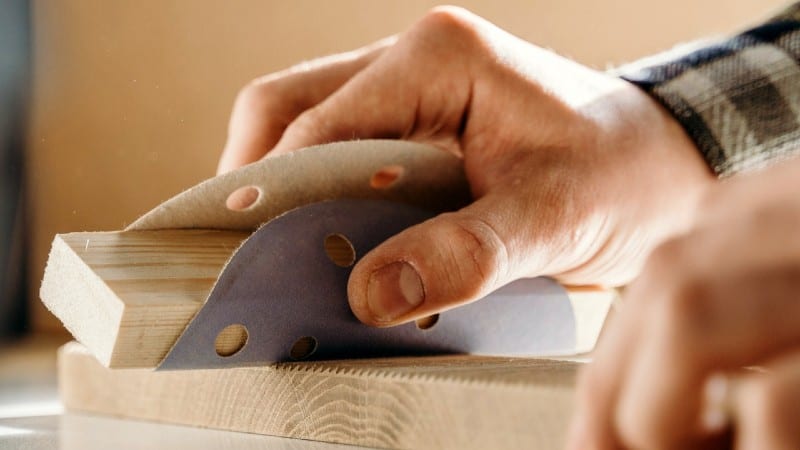 Man using a sanding block