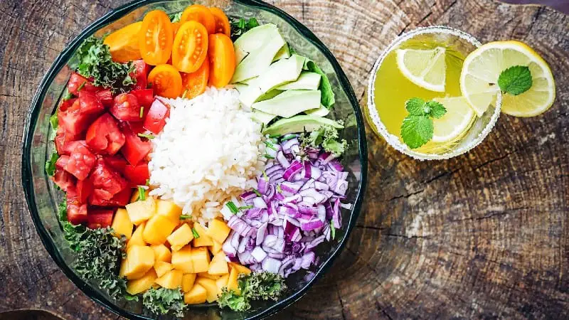 Healthy salad on a wooden stump - Woodworking is good for your health